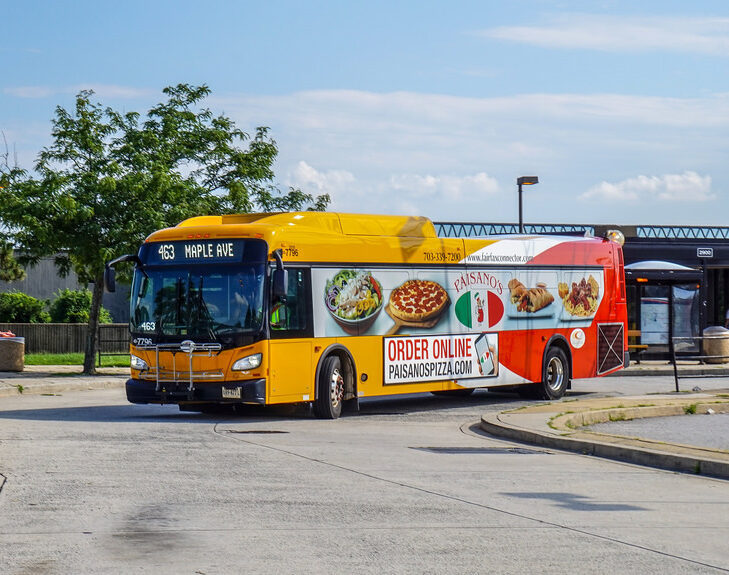 Yellow Colored Bus With Pizza Advertisement