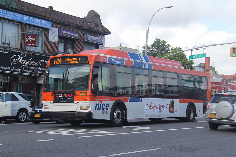 Orange Colored Bus With Disney Advertisement
